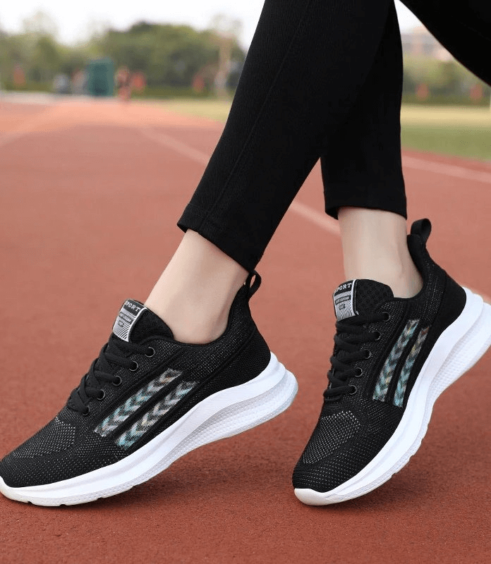 Sports Mesh Breathable Women's Shoes SF0212 in action on track, showcasing comfort, support, and breathable design for training.